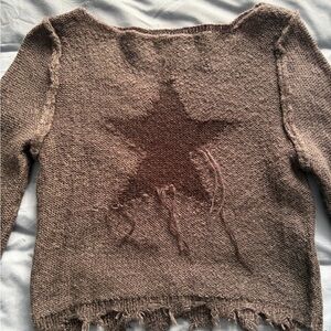 Urban Outfitters distressed star sweater